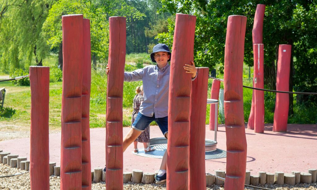 A boy playing in Lill-valla playground in Gamla Linköping. 